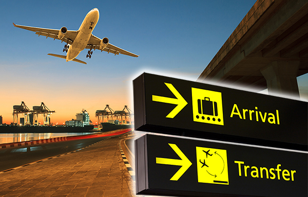 Driver welcoming arriving passengers for an airport transfer