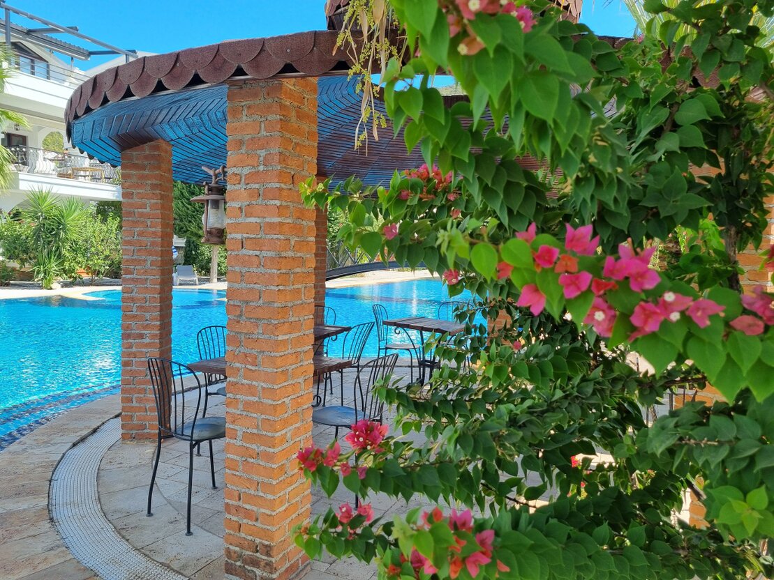 Pool and garden being maintained at a holiday property
